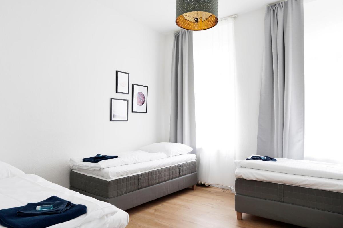 GREIF by ROCKCHAIR Apartments l SUPERHOST Status l 2 Bedrooms Boxspringbeds in City Center – Cozy Family & Business Flair welcomes you!